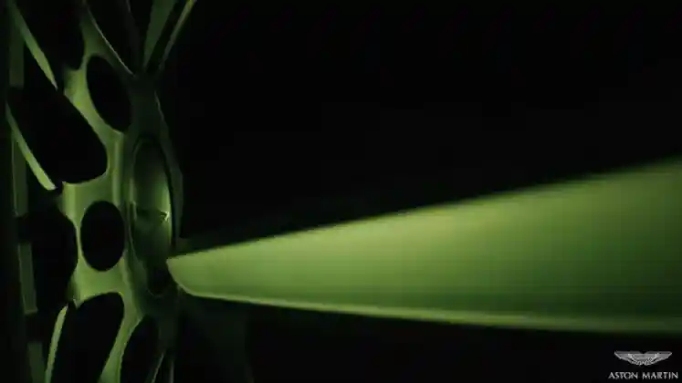 Berita - Aston Martin Sebar Teaser SUV Paling Bertenaga Di Kolong Jagad