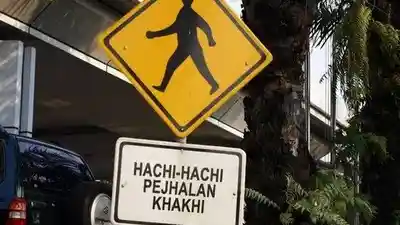 Foto - Lucu, Rambu Peringatan Unik Di Jalur Mudik