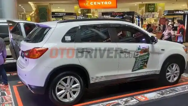 Foto - Jelang Ramadhan, Mitsubishi Guyur Depok Dengan Hujan Promo