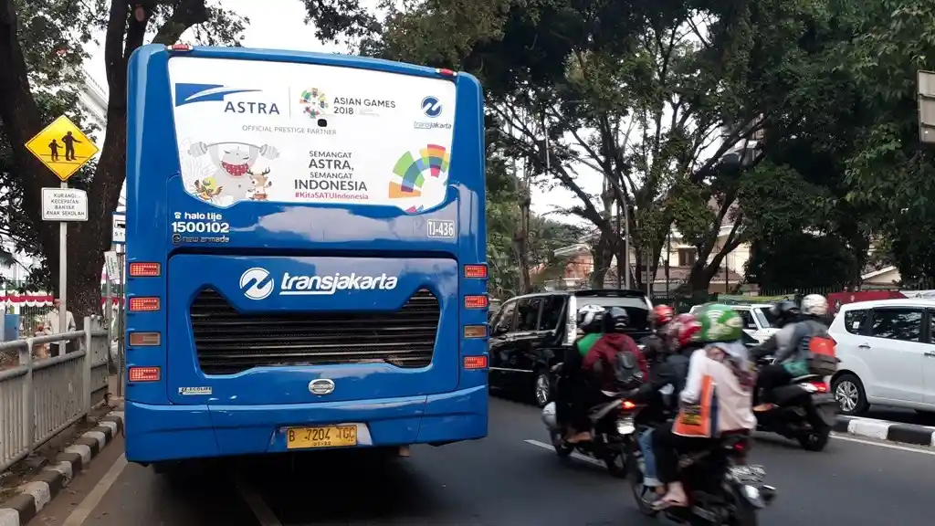 Foto - Semarakkan Asian Games 2018, 60 Unit Bus Transjakarta Kini Berstiker Astra International